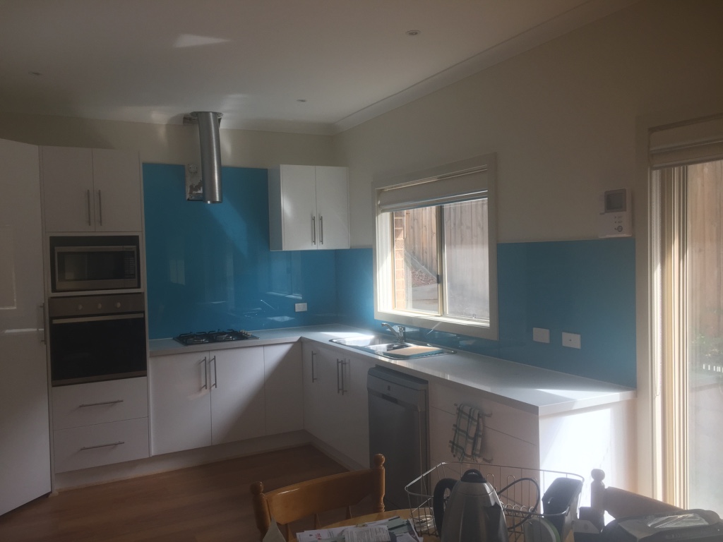 New kitchen with blue pop